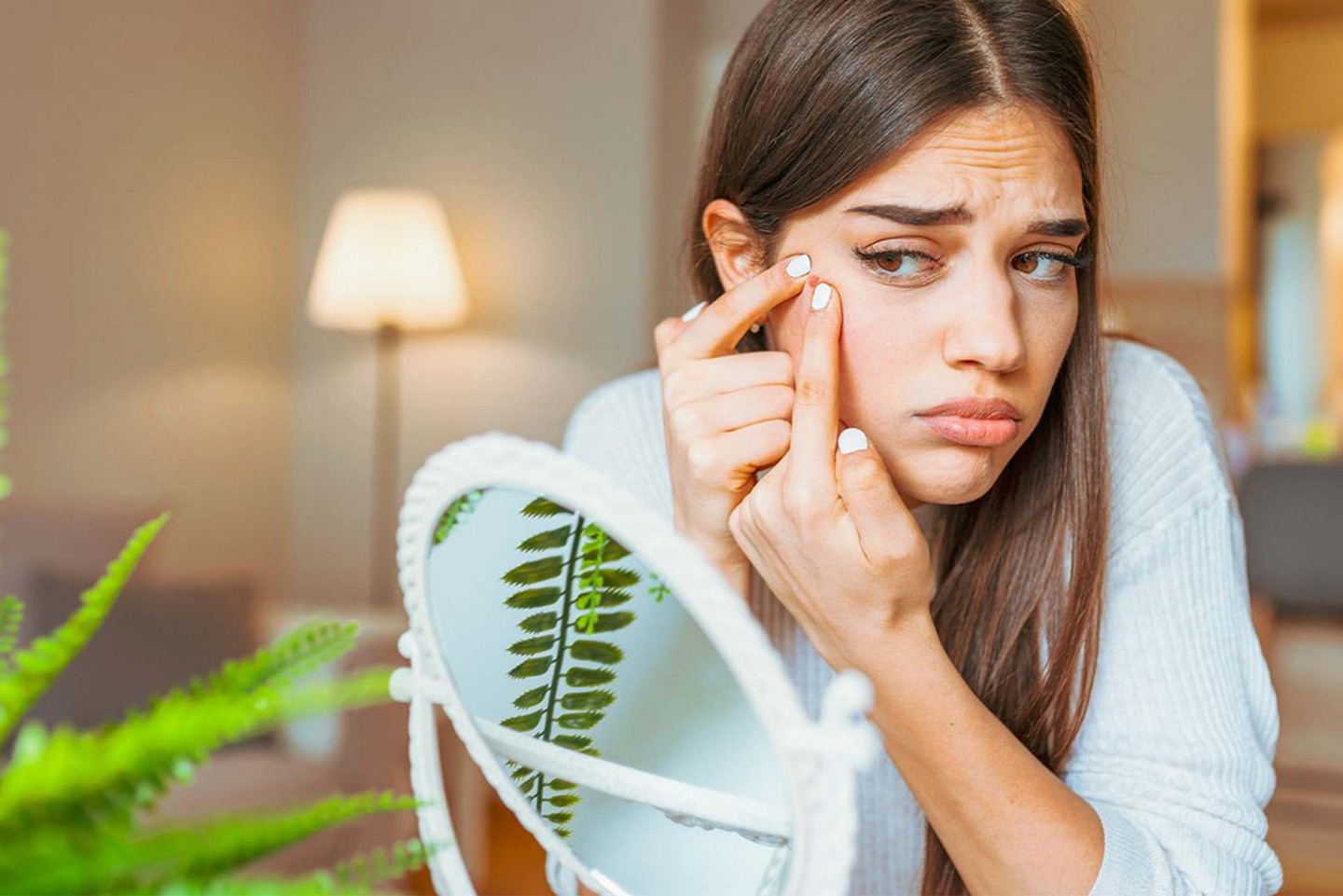 Žena s PMS-om, glavoboljama i aknama – Catafertyl